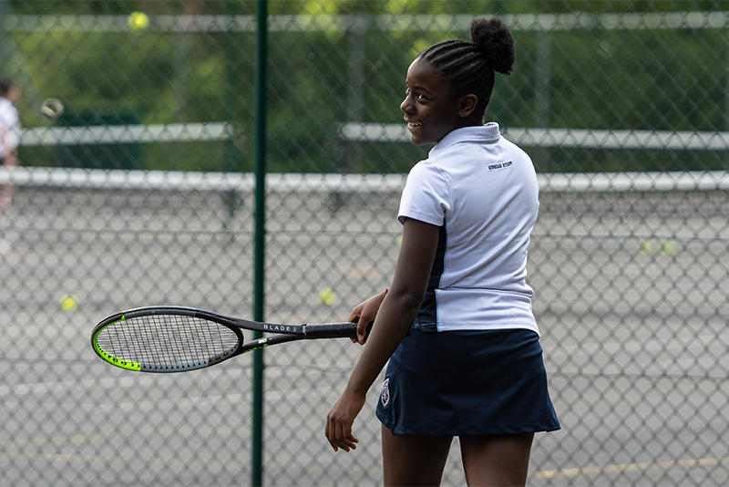 Wycombe Abbey girl playing tennis