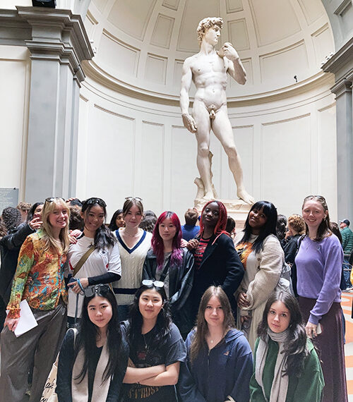 Wycombe Abbey Sixth Form pupils stood in front of the Michelangelo's David in Florence.