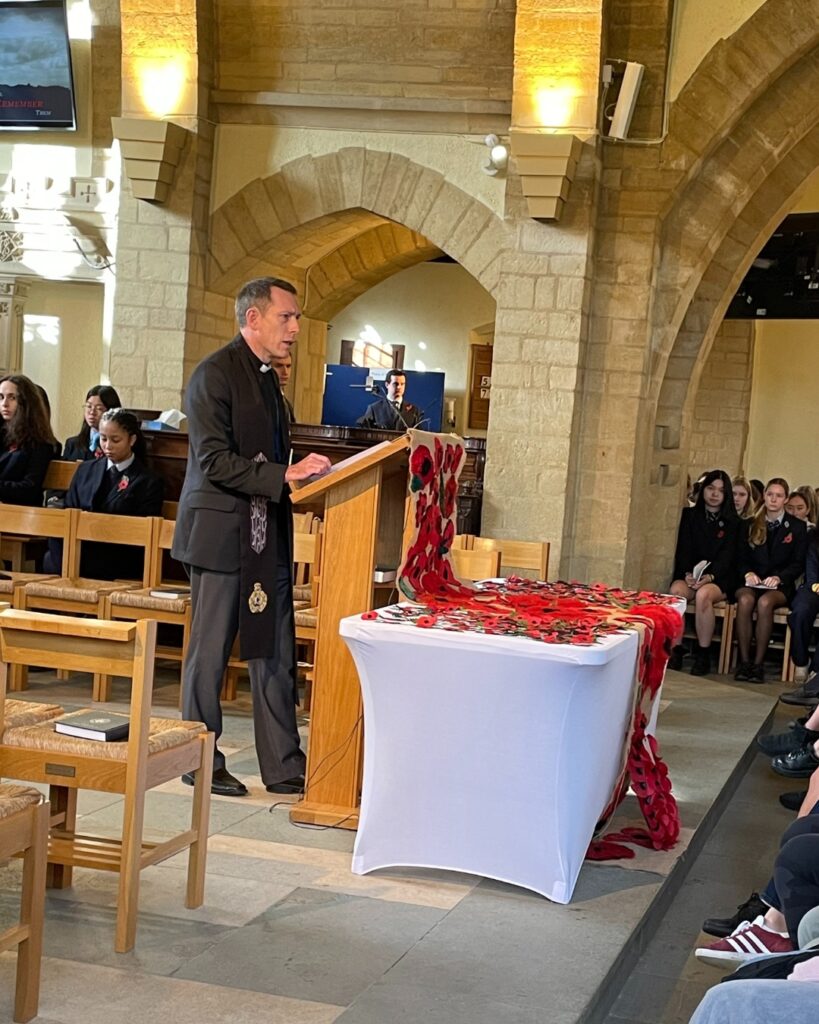 Padre Paul delivering a sermon.