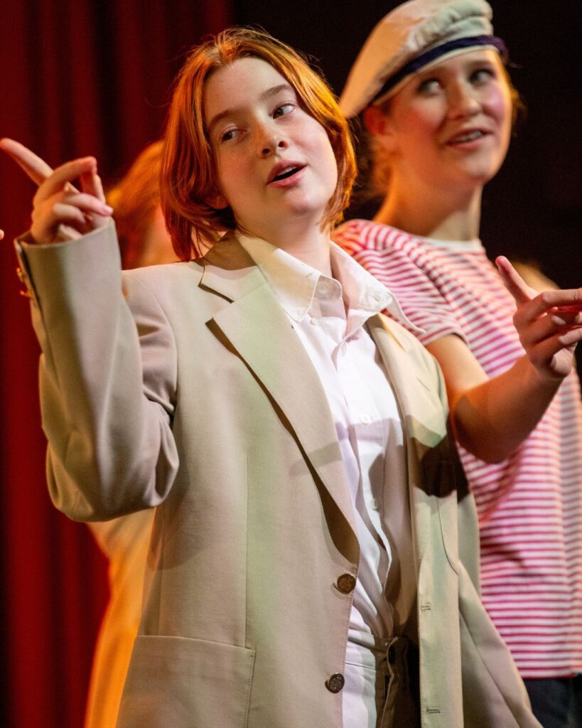 A Wycombe Abbey pupil wagging her finger.