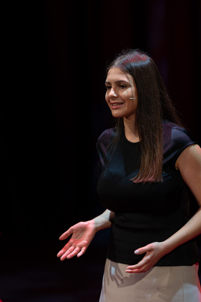 Laeticia talking passionately.