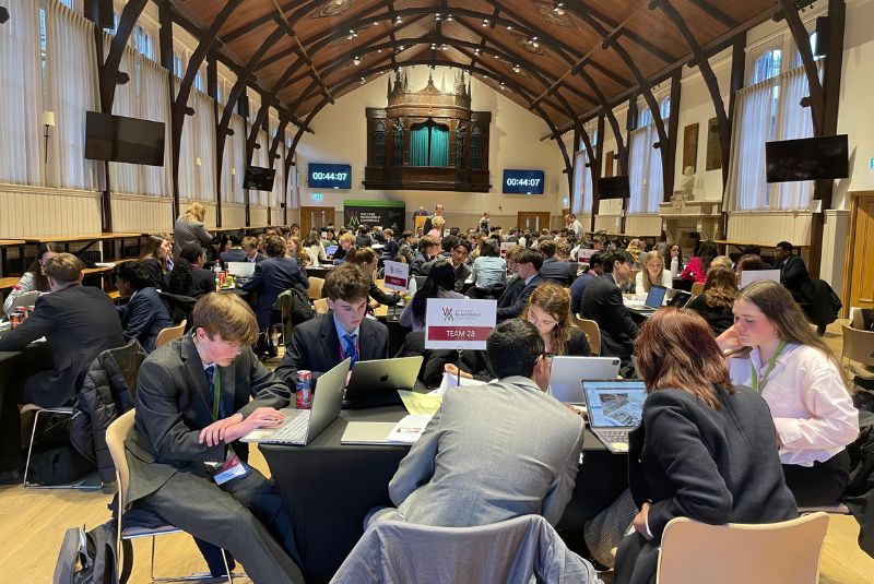 Pupils sat at tables working.