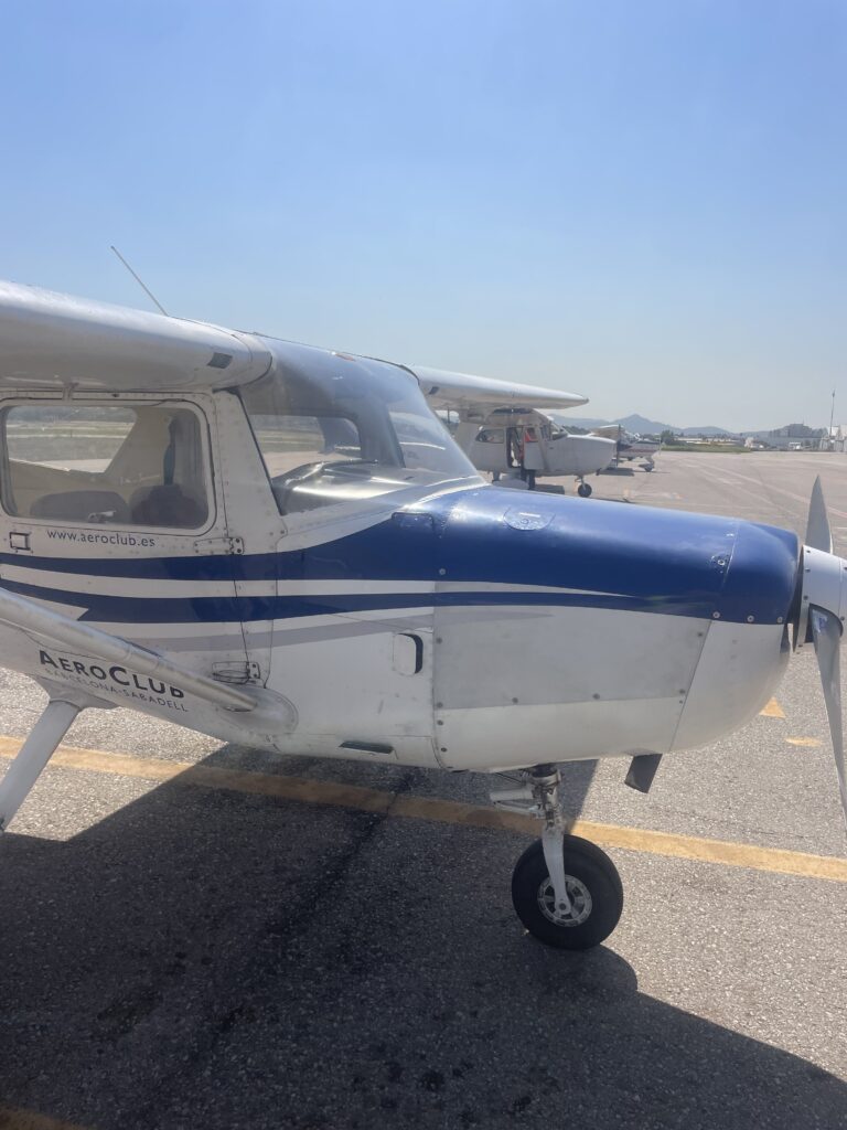 A small white and blue plane.
