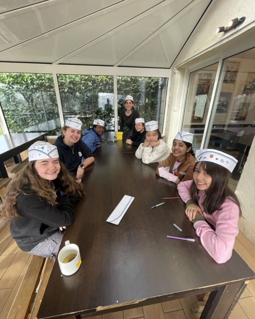 Pupils wearing their self-made chef hats.