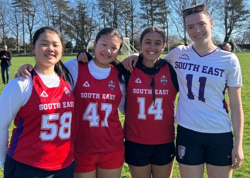Anna, Flo and their teammates in their South East Lacrosse kits.