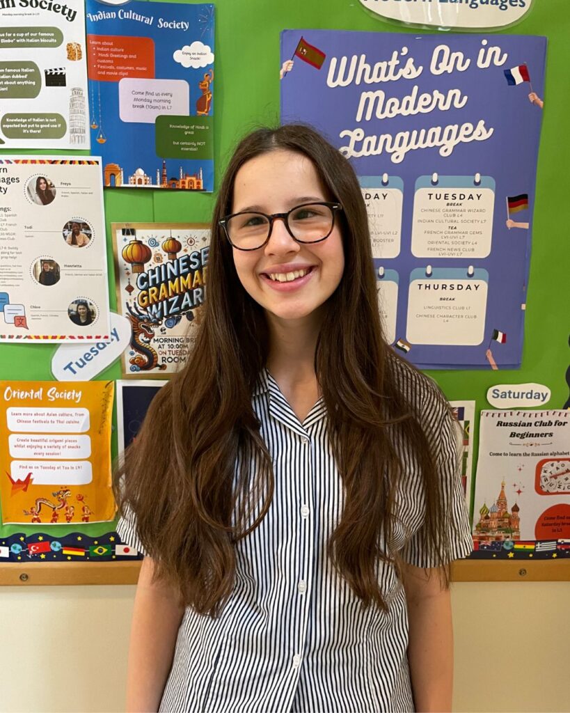 Stefania stood in front of a Modern Languages display.