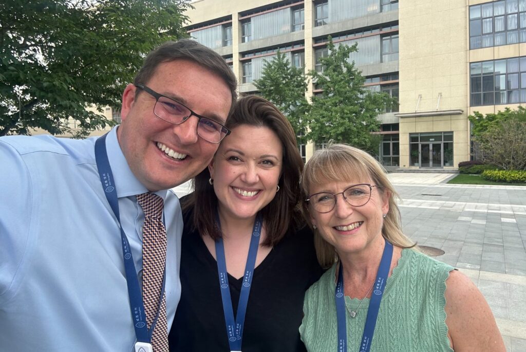 A selfie of Nick, Vicky and Margot outside Wycombe Abbey Changzhou.