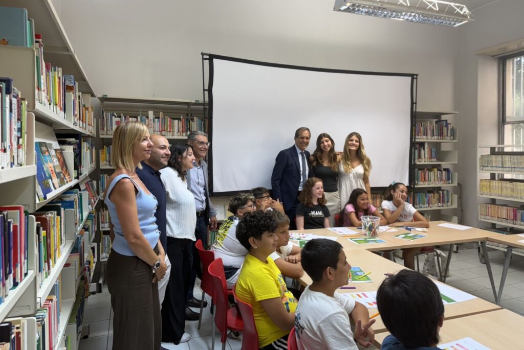Mati, her friend, their students and local government officials.