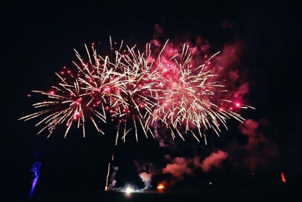 Fire works in the night sky red